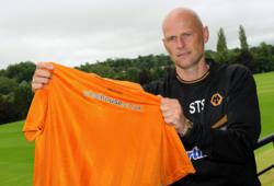 Ståle Solbakken, manager of Wolves, with the new first team shirt